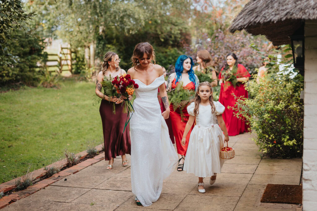 Prestwold Hall bride and party walking to the ceremony room