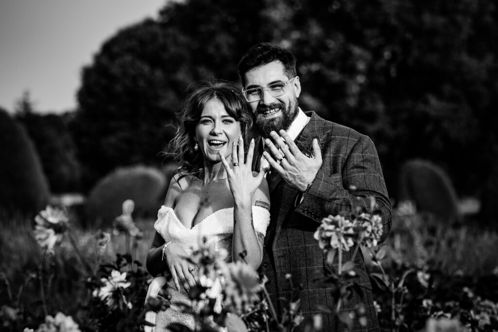 Just married photo at Prestwold Hall wedding rings