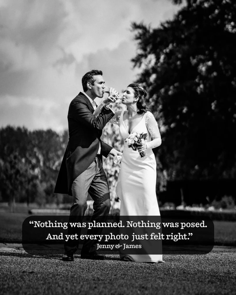 Bride and groom drinking champagne and laughing together in the garden